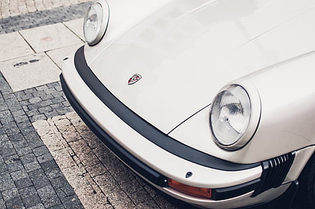 white Porsche sports car thumbnail