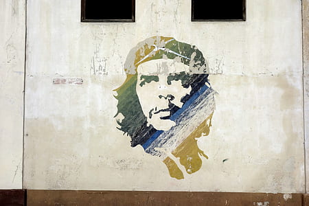 man painting on wall thumbnail