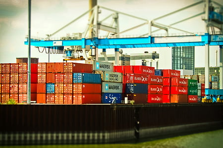 red and blue ship containers at daytime thumbnail