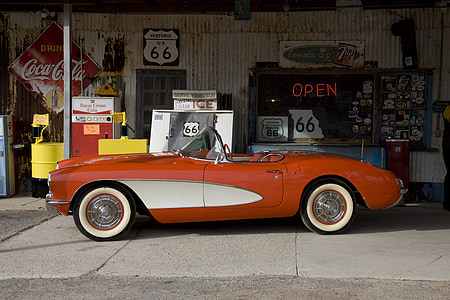 classic red coupe parked near store thumbnail