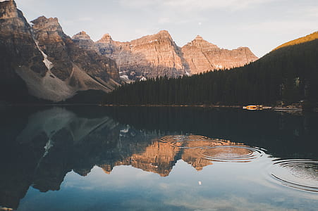 lake near snow-covered mountains thumbnail