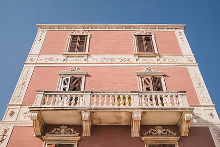 low angle view of pink concrete building thumbnail