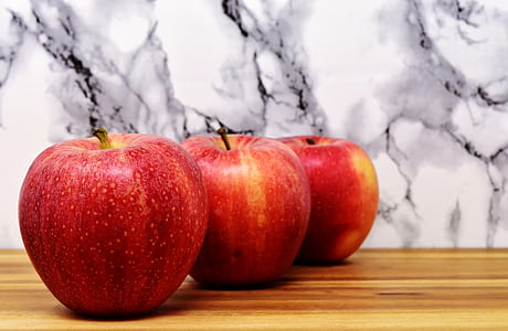three red apple fruits thumbnail