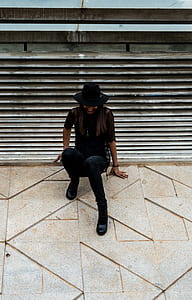 woman crouching on floor thumbnail