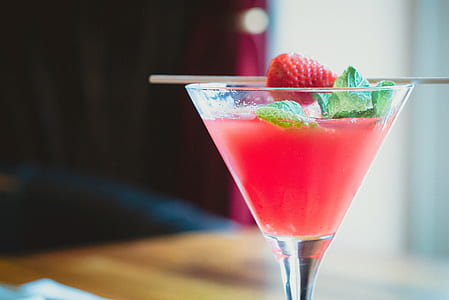 red cocktail filled in cocktail glass thumbnail