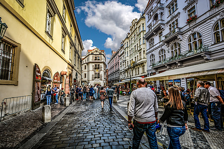 people walking on street beside building thumbnail