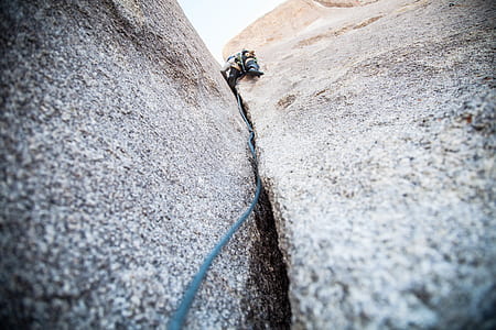 person climbing on rovk thumbnail