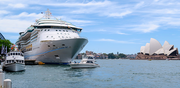 white ship docked near Sydney Opera House during daytime thumbnail