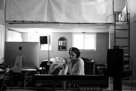 man inside music listening to music in greyscale photo thumbnail