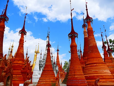 brown temples under blue sky and white clouds during daytime thumbnail