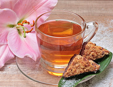 pink lily with tea and pastry thumbnail