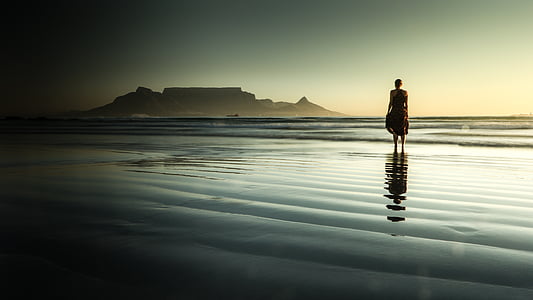 man standing on body of water thumbnail