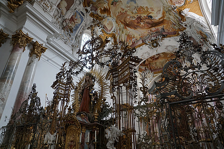 religious man's figurine inside cathedral thumbnail