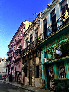 pink, brown, and green concrete houses thumbnail