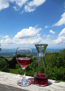 clear wine glass beside glass decanter thumbnail