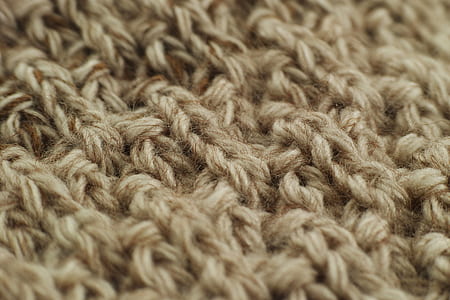 closeup photography of brown knitted mat thumbnail