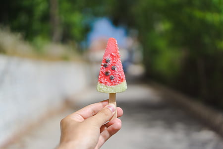 person holding watermelon ice cream thumbnail