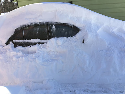 snow covered black car thumbnail