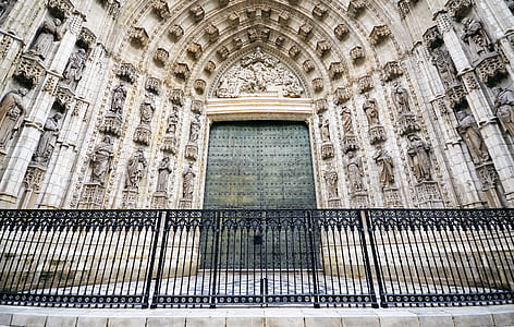 brown concrete building with black gate thumbnail
