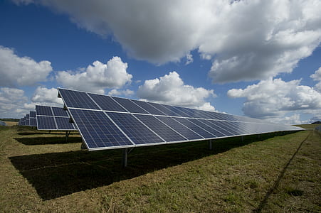 black solar panels under cloudy skies thumbnail