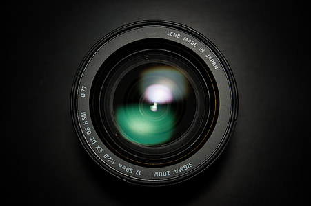 close up photo black camera lens thumbnail
