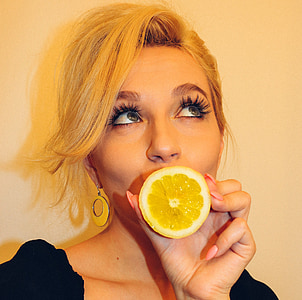 woman holding lemon while eyes rolling thumbnail
