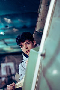shallow focus photography of boy thumbnail