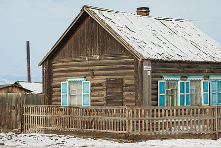 closed brown wooden house thumbnail