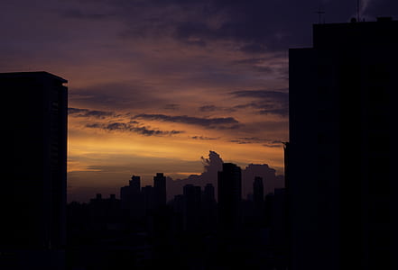 silhouette photography of a high rise buildings thumbnail