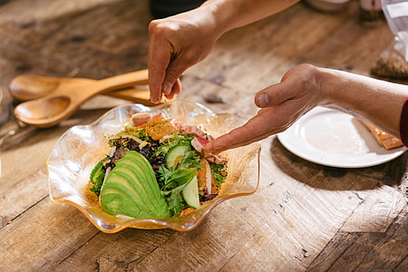 Preparing avocado salad thumbnail