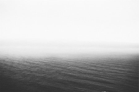 body of water under fog thumbnail