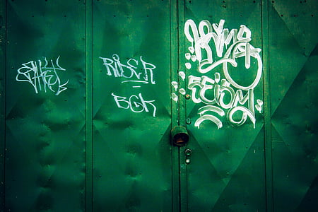 white paint on green metal gate thumbnail