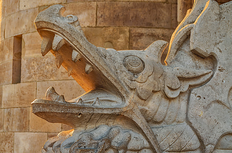 photography of alligator statuette during daytime thumbnail