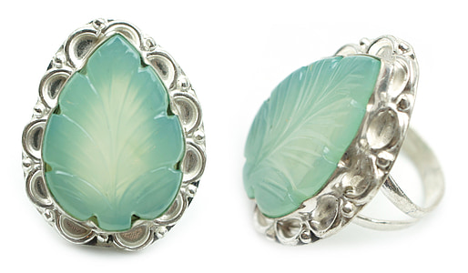 two green leaf gemstone rings o white background thumbnail