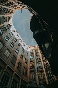Worm Eye Photograph of Brown Building thumbnail