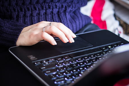 person using black laptop computer thumbnail