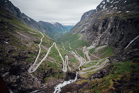 aerial view photography of road beside mountain during daytime thumbnail