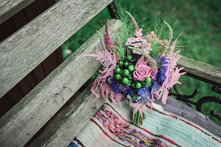 pink Rose and pink Celosia flower centerpiece at daytime thumbnail