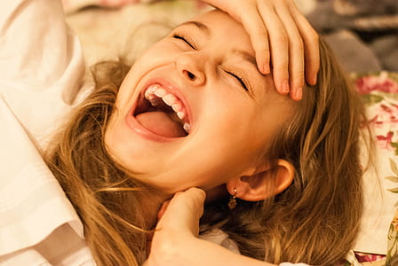 girl holding her forehead thumbnail