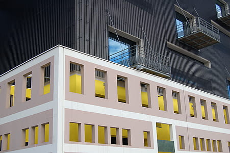 white and yellow concrete building thumbnail