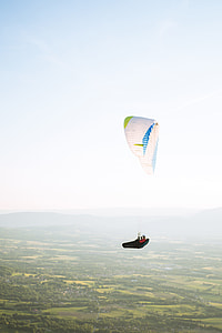 person parachuting on mid air thumbnail