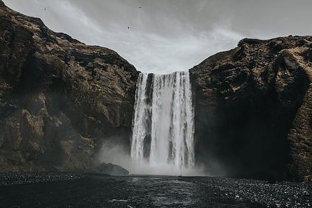 time-lapse photography of flowing plunge waterfall thumbnail