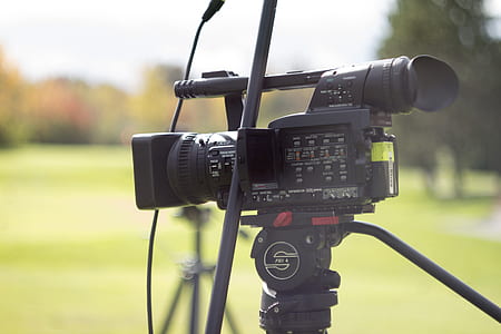 black video recorder on tripod thumbnail
