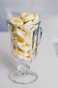 sliced babanas on footed glass thumbnail