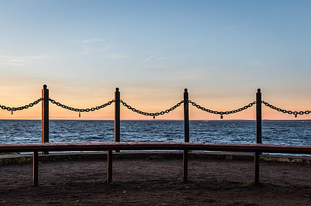 Four Metal Poles With Link Chains thumbnail