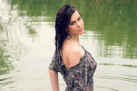 woman wearing black and white floral top in the swamp thumbnail