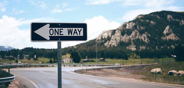 selective focus photography of One Way signage thumbnail