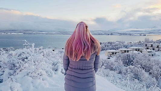 woman standing on hill thumbnail