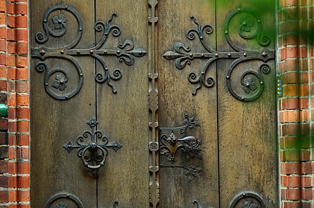 black metal and brown wooden gate thumbnail