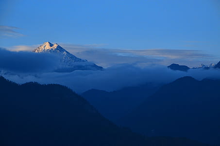 covered snow mountain at golden hour thumbnail